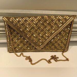 Gold embellished clutch
